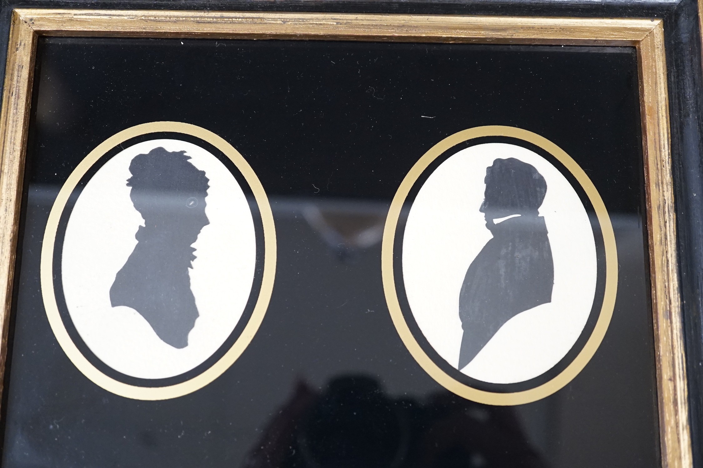 Four framed sets 19th century silhouettes, one with two silhouettes, together with four separate frames